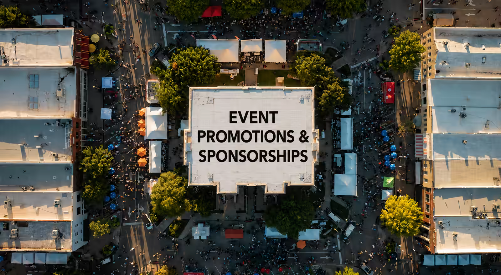 Aerial view of a downtown street festival promoted by RMG